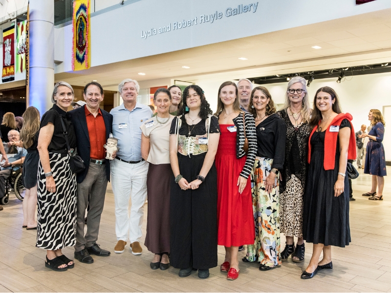 The Ruyle family and first scholarship recipient Maya Hariston-Chase, center, celebrate the dedication of the Lydia and Robert Ruyle Gallery (2025)