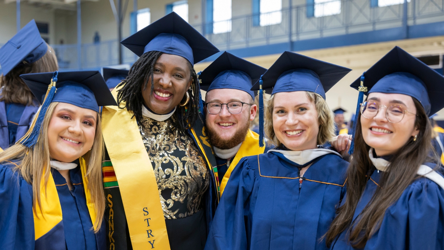 Graduates celebrate at Commencement, 2025