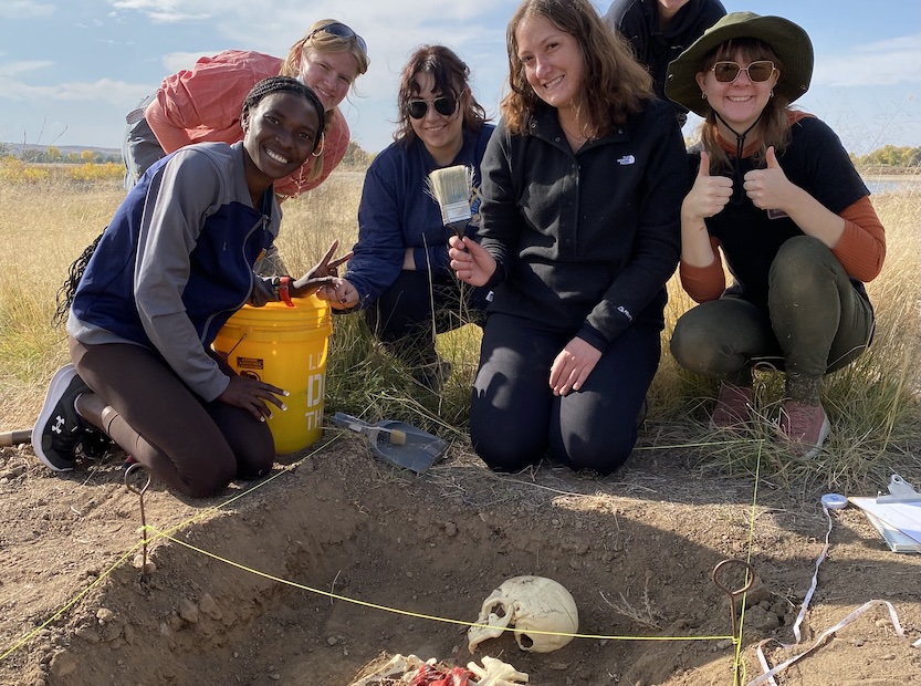 UNC Anthropology students participate in a mock burial excavation.
