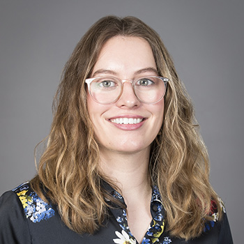 Headshot of Brenna Rhiness.