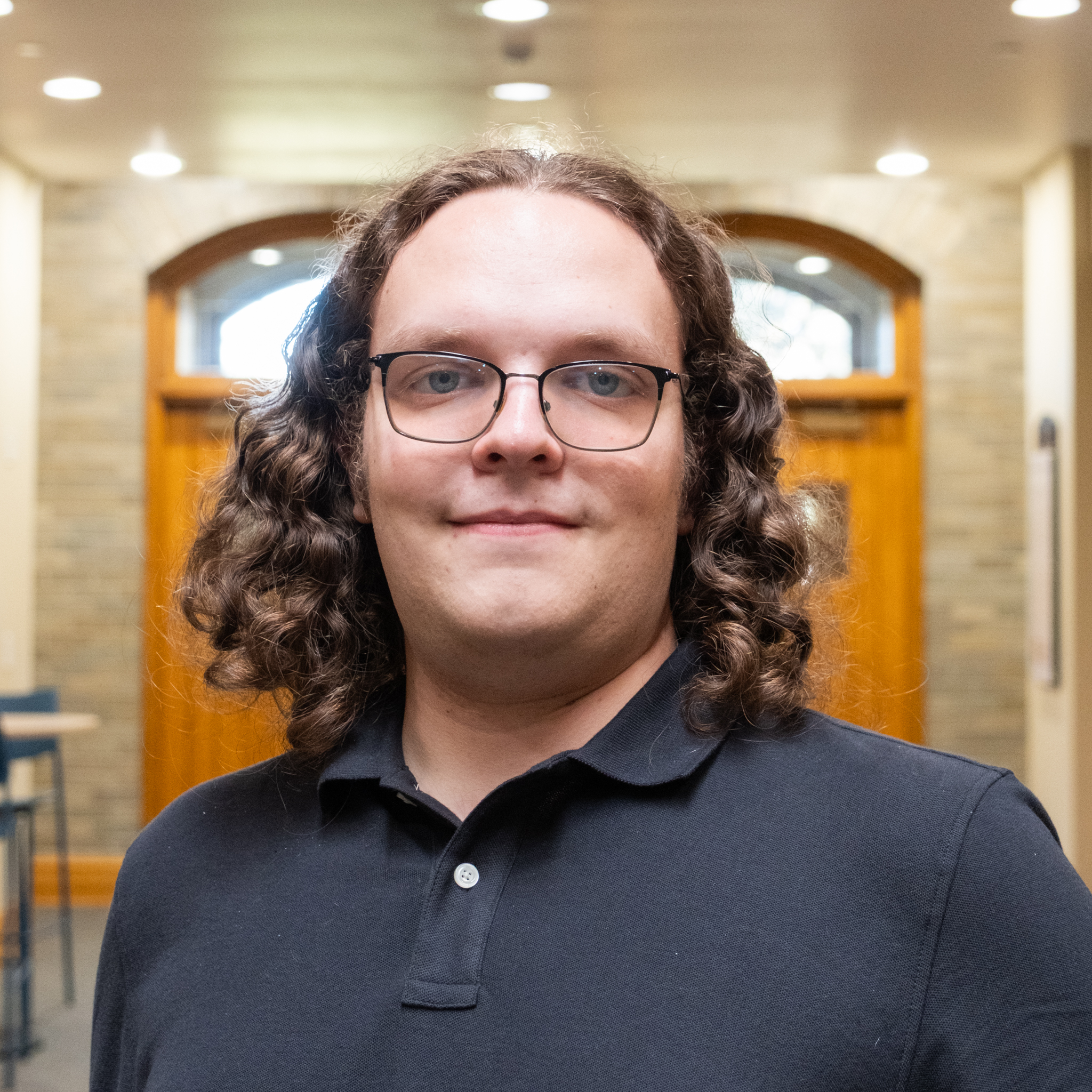 Headshot photo of Alex Sasse