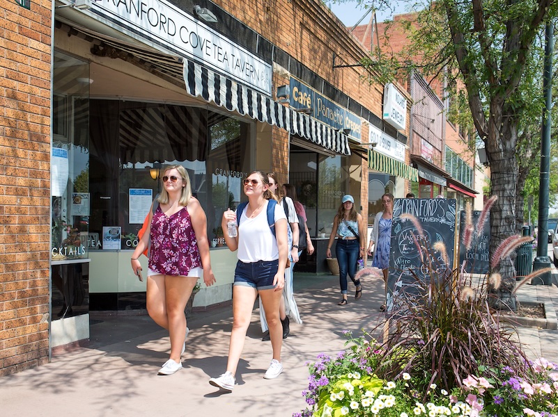 Two female students enjoying downtown Greeley