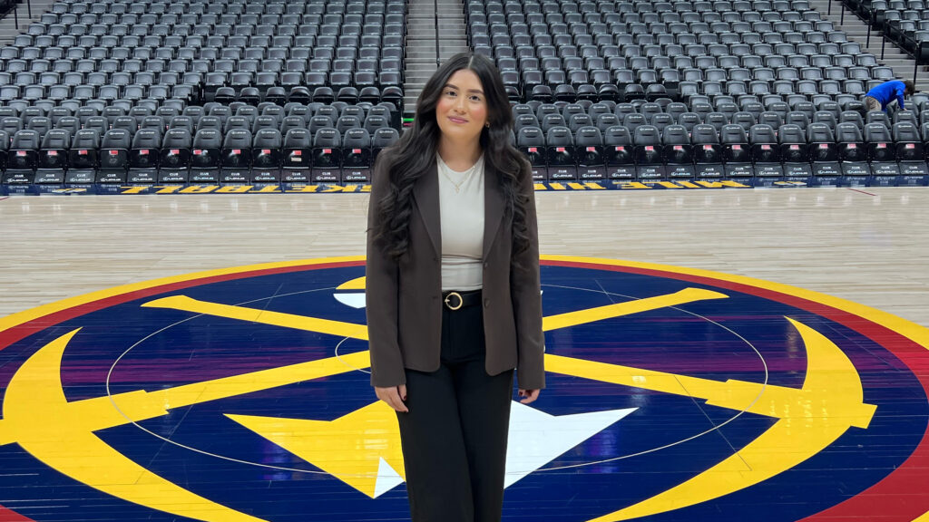 Jasmin Mazariegos Rodriguez standing on the Nuggets court