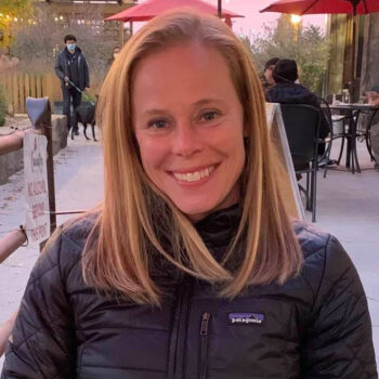Jill Bezyak outside wearing a coat and smiling at the camera