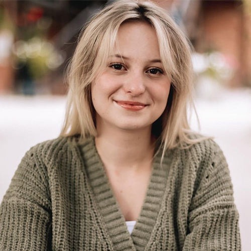 a headshot of Kinsley Walker