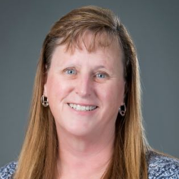 Headshot photo of Tina Farrell