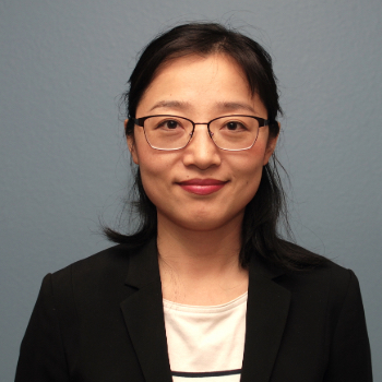 Headshot photo of Yuyan Han in front of a gray background
