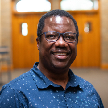 Headshot photo of Aaron Apawu