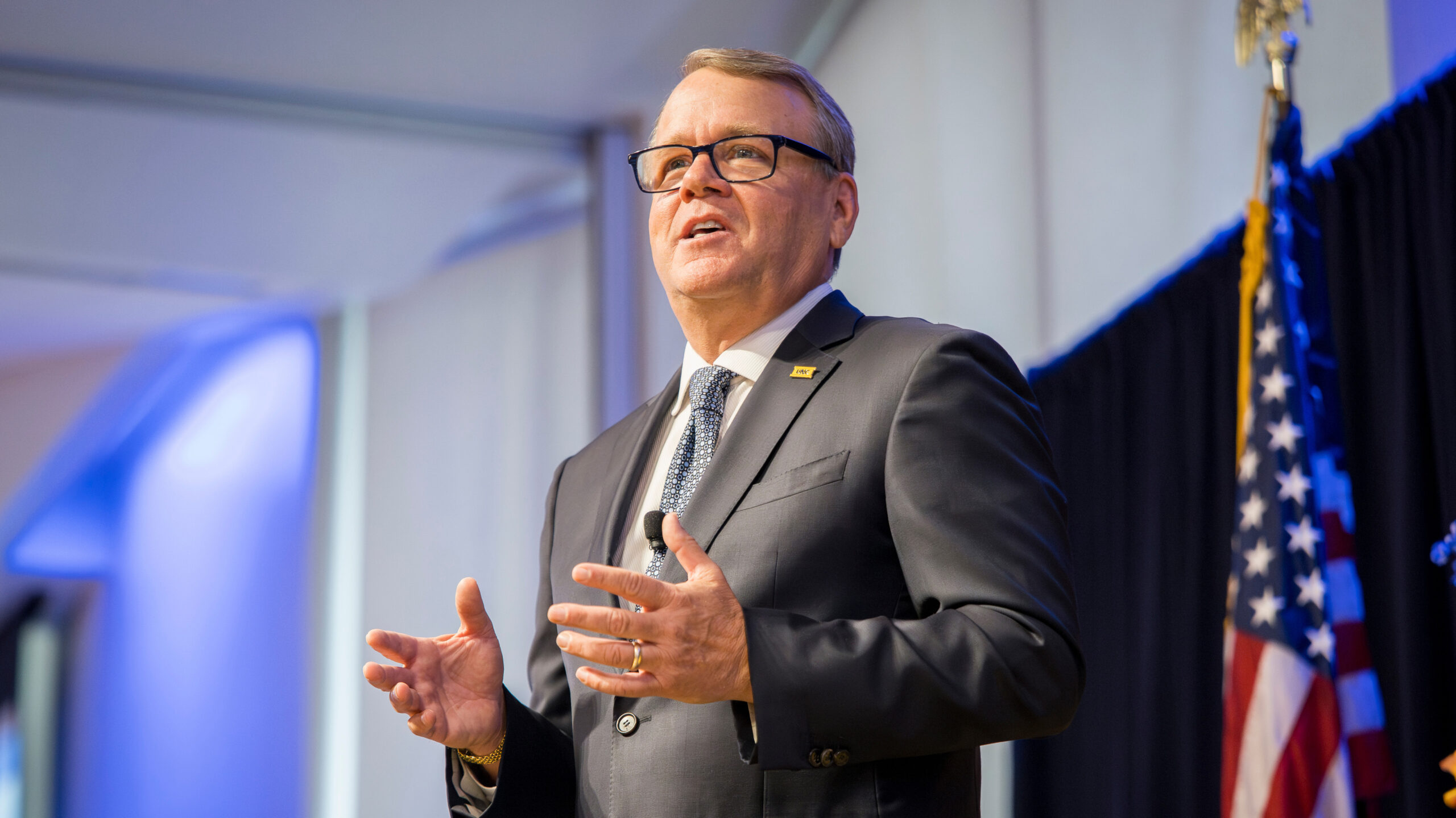 Andy Feinstein talking during a speech