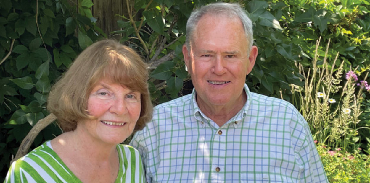 Alumni Robert and Sharon Baldwin standing side-by-side in outdoors.