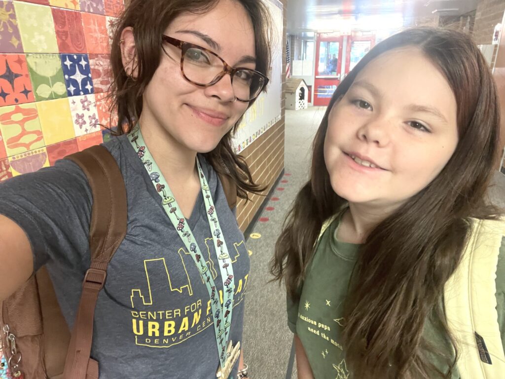 CUE Student Bella Berryman with One of Her Students