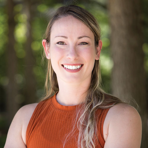 A headshot of Bonnie Buss smiling