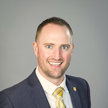 Headshot of Brett Kahler.