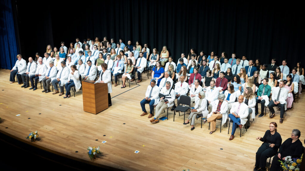 All the med students on stage at the white coat ceremony