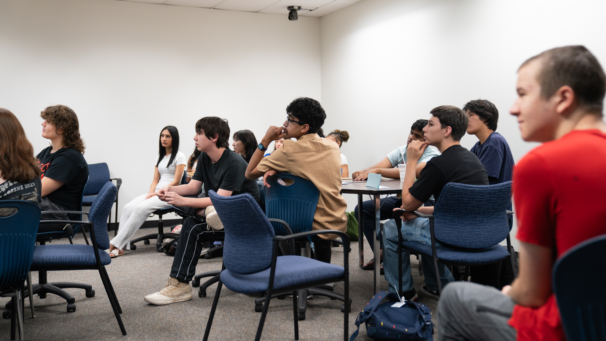 Students listening to a lecture in classroom