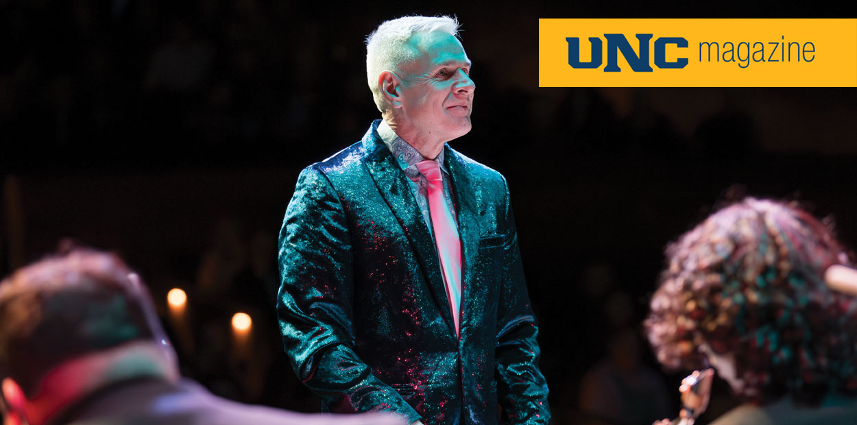 Dana Landry smiling into a crowd