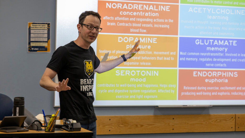 A teacher standing up and talking to students in a classroom at the Future Teacher Conference