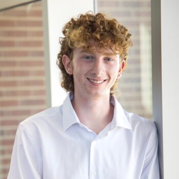 Grayden Pustilnik headshot.