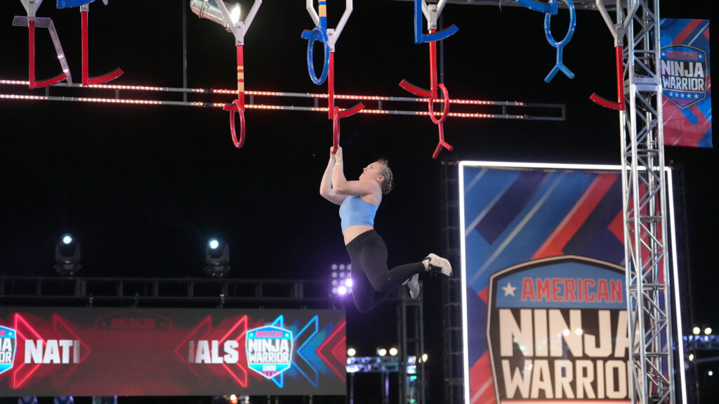 Taylor Greene is competing on American Ninja Warrior, swinging on hoops