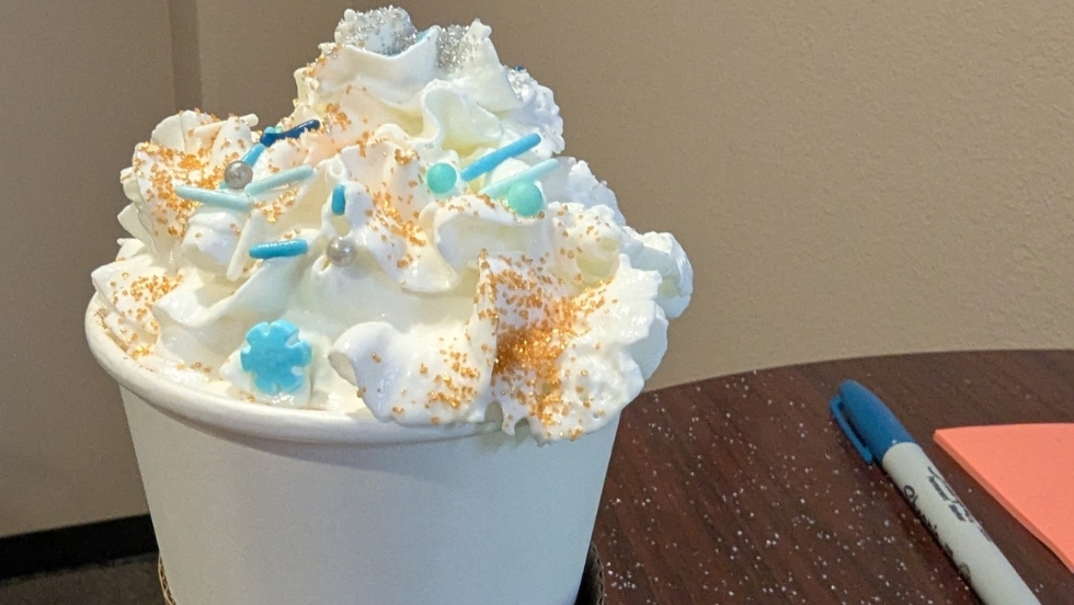 Hot chocolate with whipped cream and sprinkles