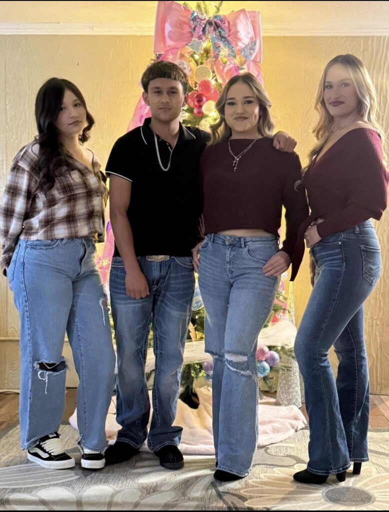 2026 graduate Janel Dominguez&nbsp; (second from right) with her siblings