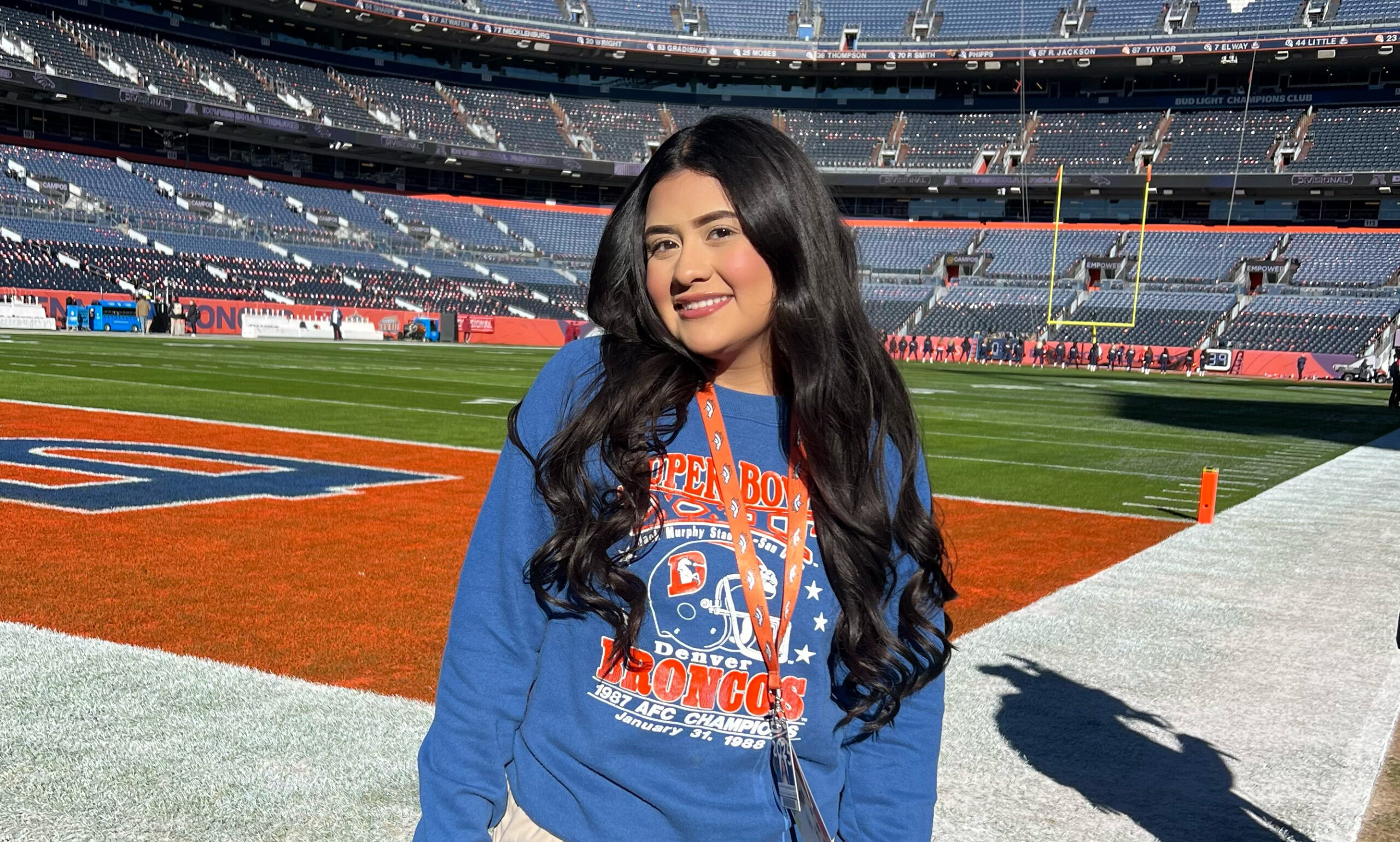 Jasmin Mazariegos Rodriguez standing on the Broncos stadium