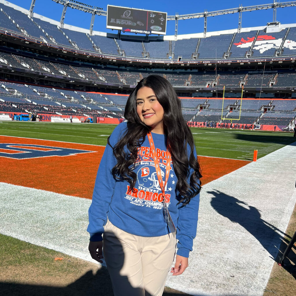 Jasmin Mazariegos Rodriguez standing on the Bronco stadium field