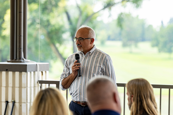 interim president haddad speaking at event