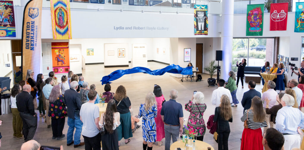 A blue banner falling showing the name Lydia and Robert Ruyle Gallery on the wall