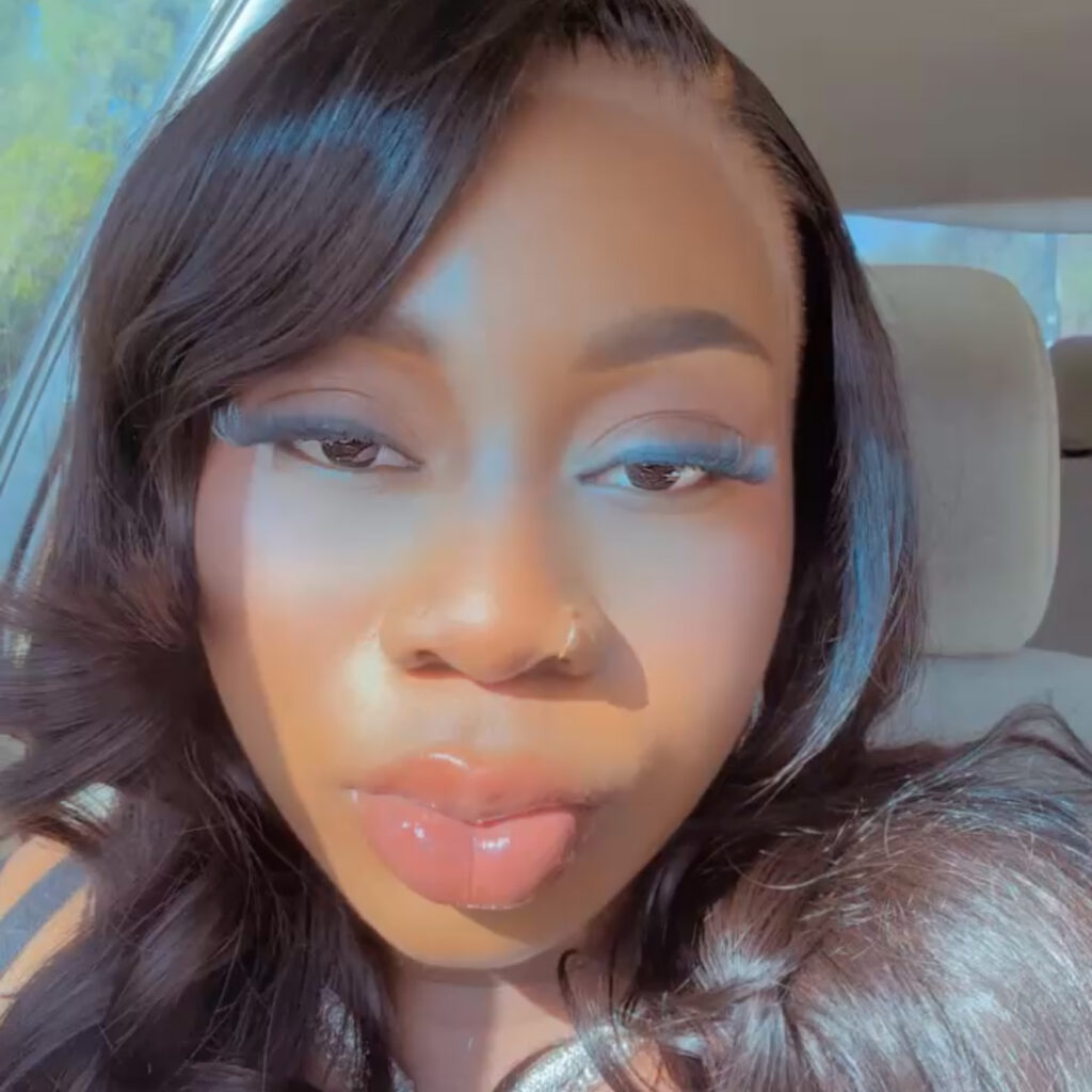 A headshot of Mariam Sanusi