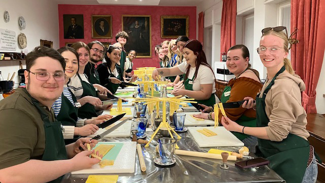 UNC students participating in a cooking class in Italy