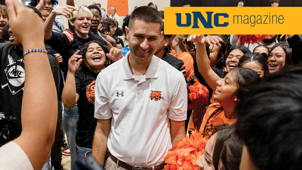 UNC alum and Colorado 2026 Teacher of the Year Stephen Paulson surrounded by cheering high school students.