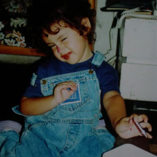 A toddler picture of Roddy Hunt wearing overalls
