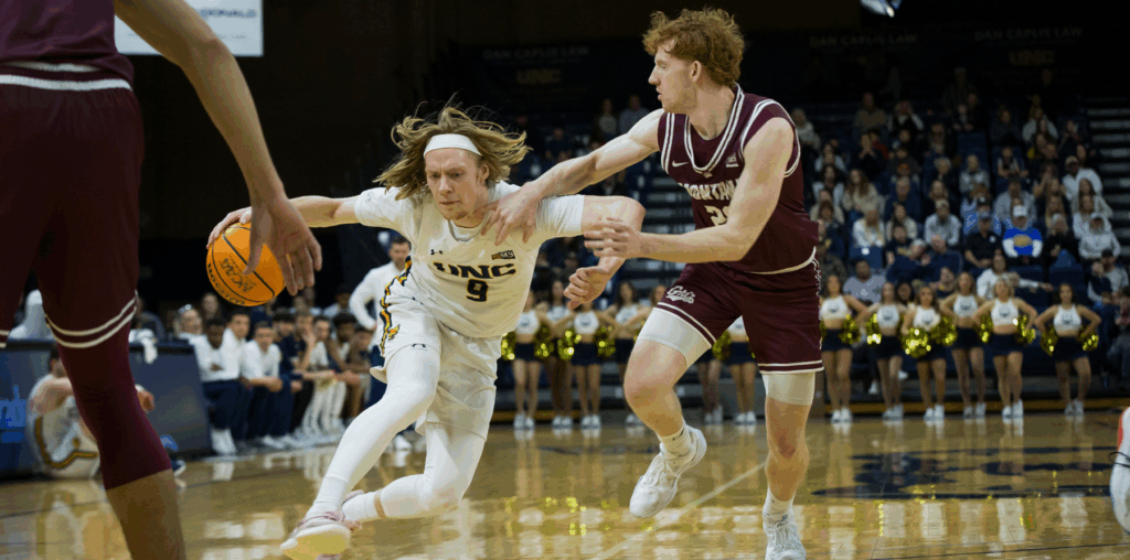 Student Athletics playing basketball game.