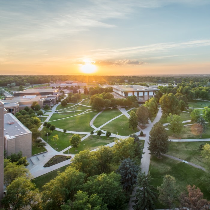 Aerial view of UNC west campus at sunset.