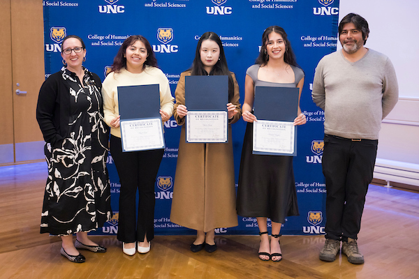 Samara Vasquez, Aleyda Loya, and Yuxin Jiang at the Honors Convocation with Dr. Erin Noelliste and Dr. Enrique Bernales Albites