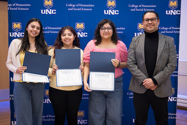 Vivian Gonzalez, Aleyda Loya, and Jennifer Zambrano with Professor Jonathan Alcantar