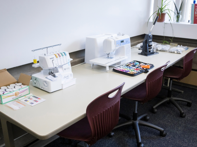 A wide shot of the sewing station at the Innovation Den