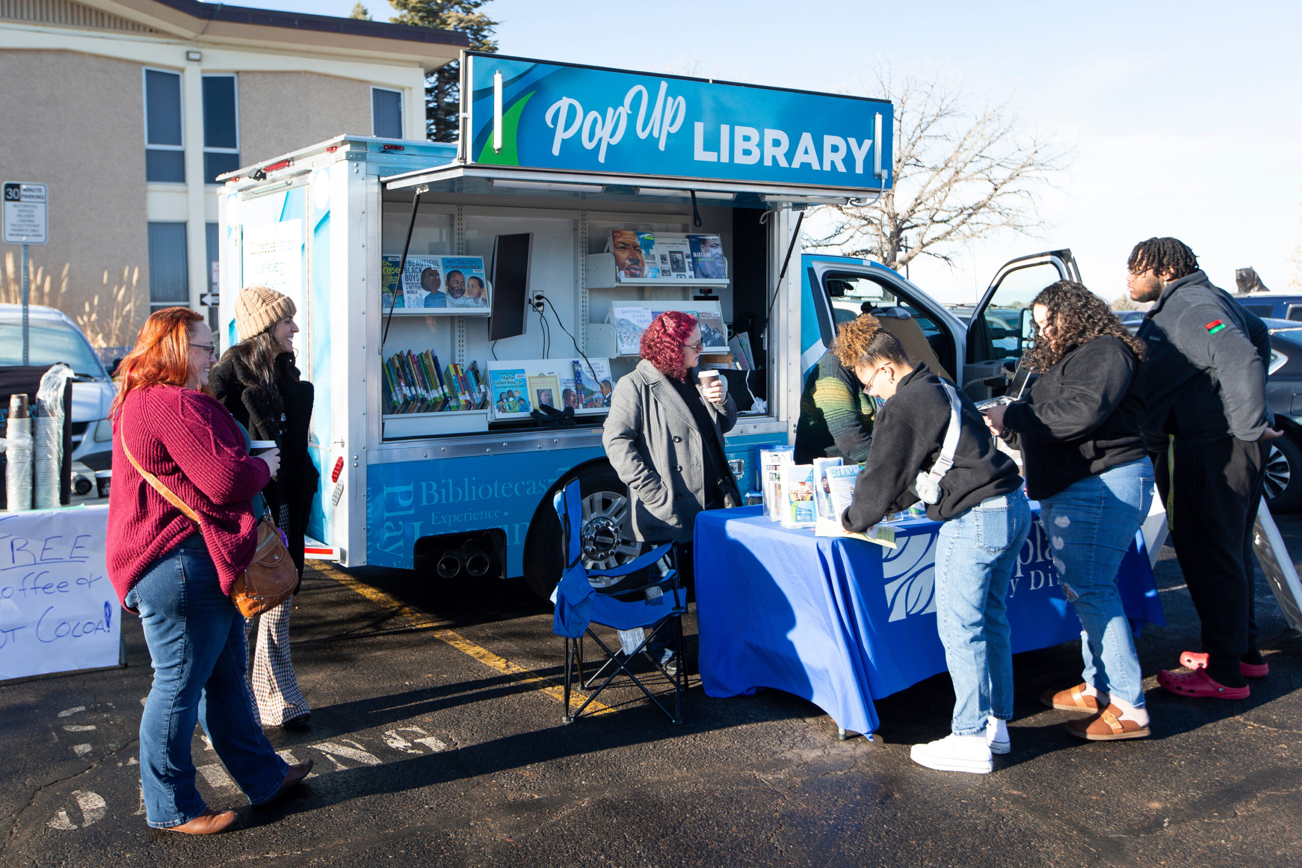 MLK Day of Service, Students in line for the mobile bookstore at UNC.