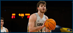 Men's Basketball athlete getting ready to shoot a free throw