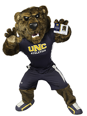 Klawz  the UNC Mascot holding up a UNC student card.