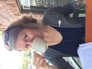 picture of woman with blond hair drinking coffee