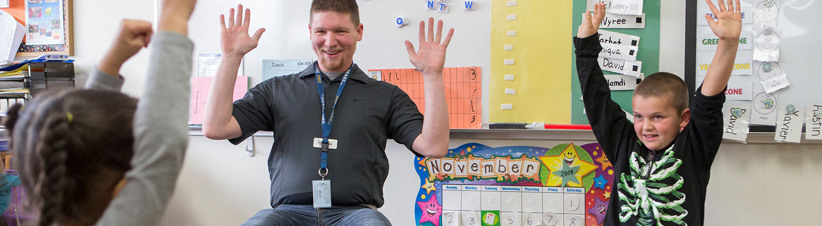 Student in classroom with students