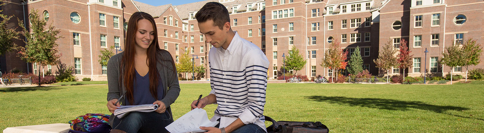 Two students studing infront of North Hall