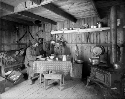 Three Miners in Their Cabin