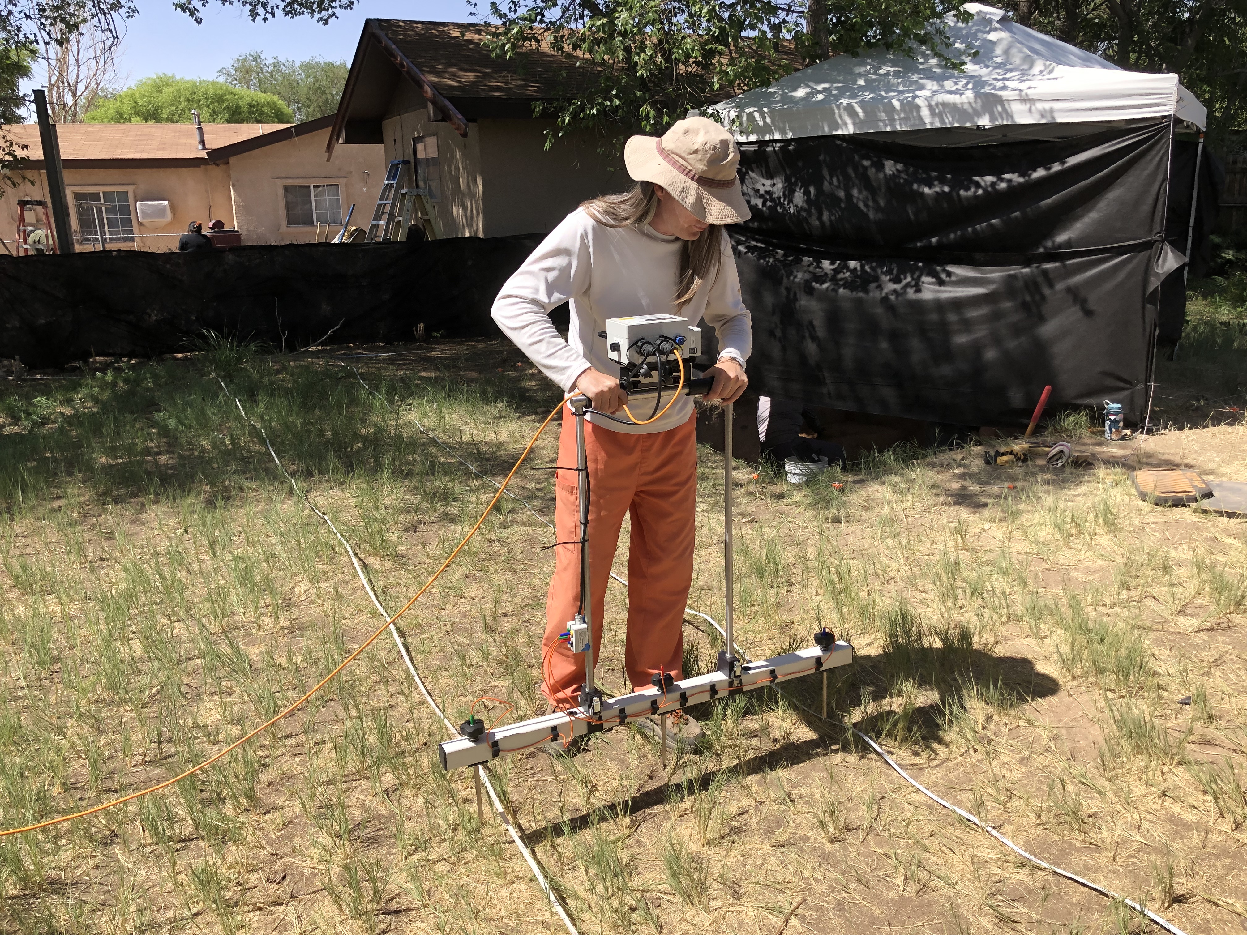 Andy operating a resistance meter, New Mexico.
