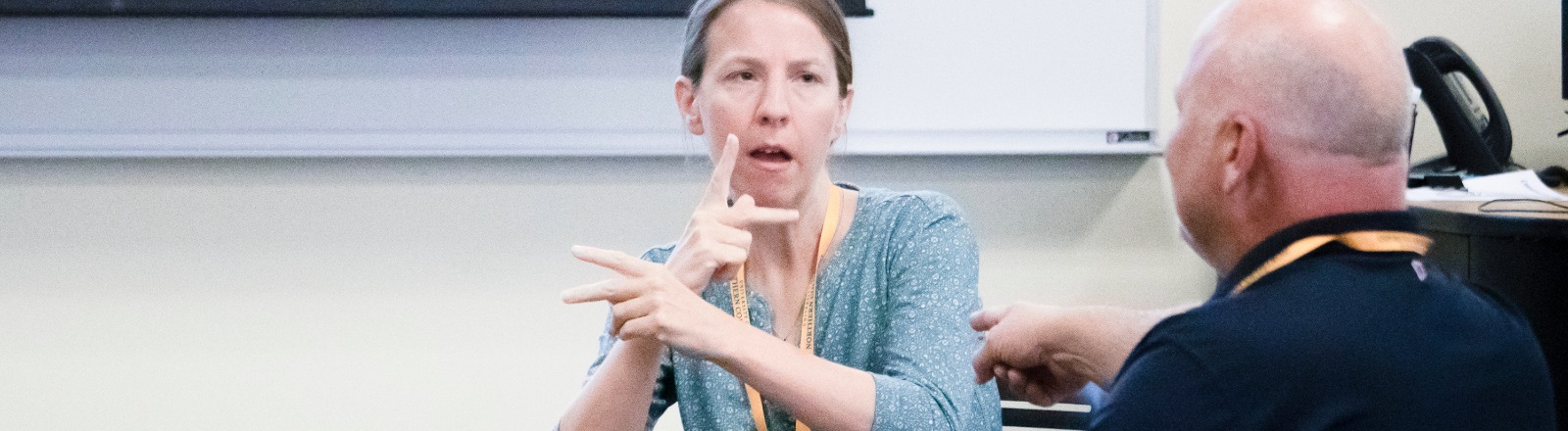 Two individuals in a conversation