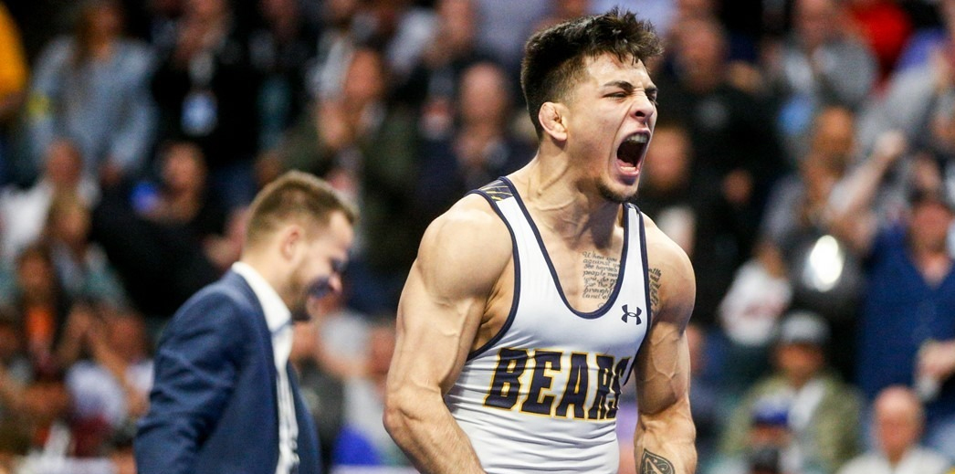 Andrew Alirez shouting in excitement after winning the NCAA championship in wrestling