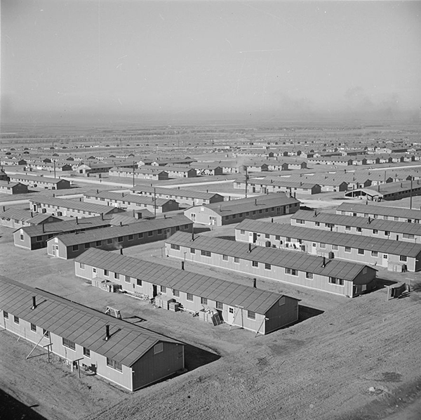 Granada Relocation Center, Amache, Colorado. A general all over view of a section of the emergency center looking north and west.