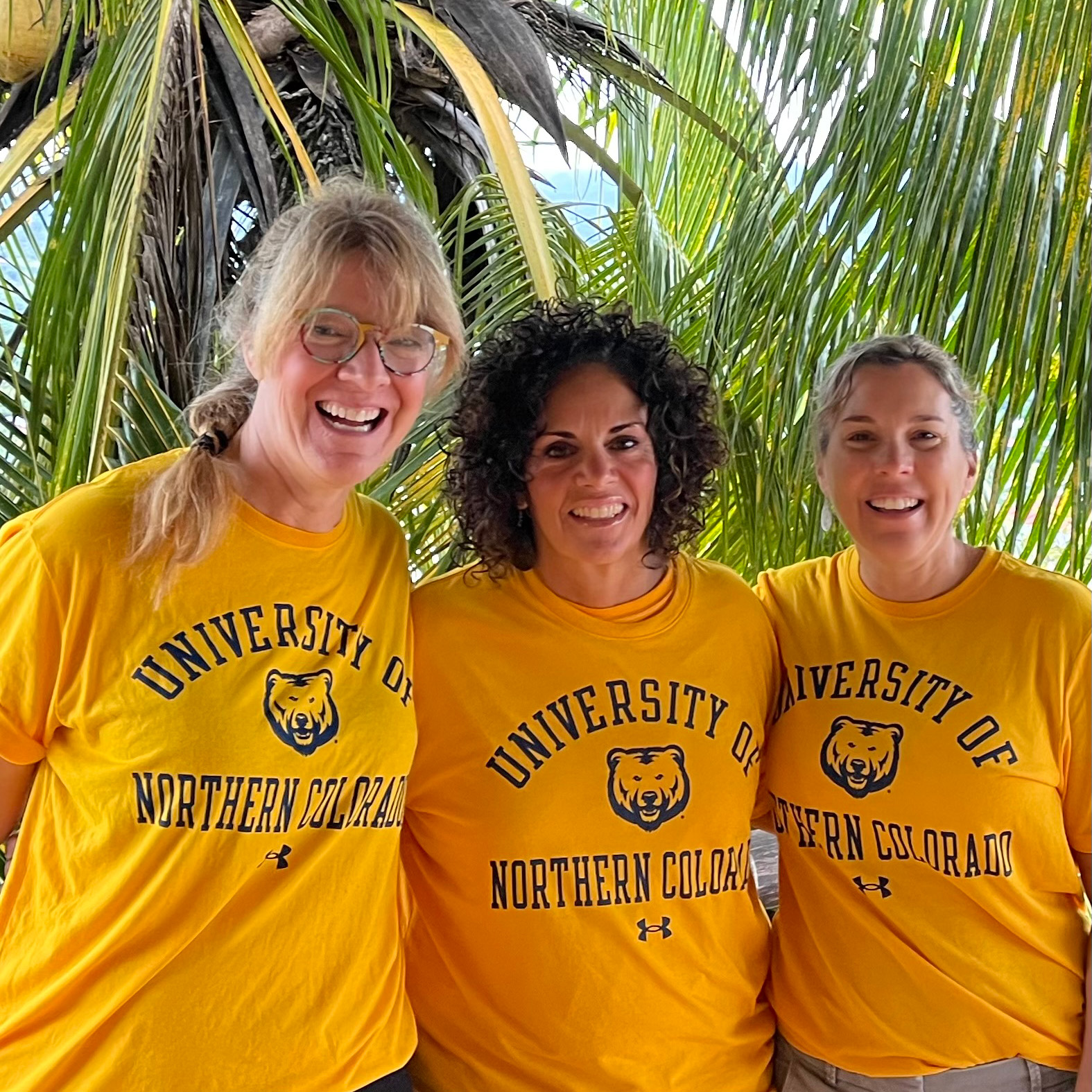 Three UNC professors standing in Belize